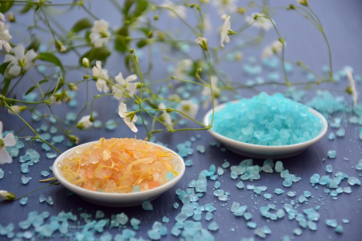 Citrus and aqua bath salts with white blossoms